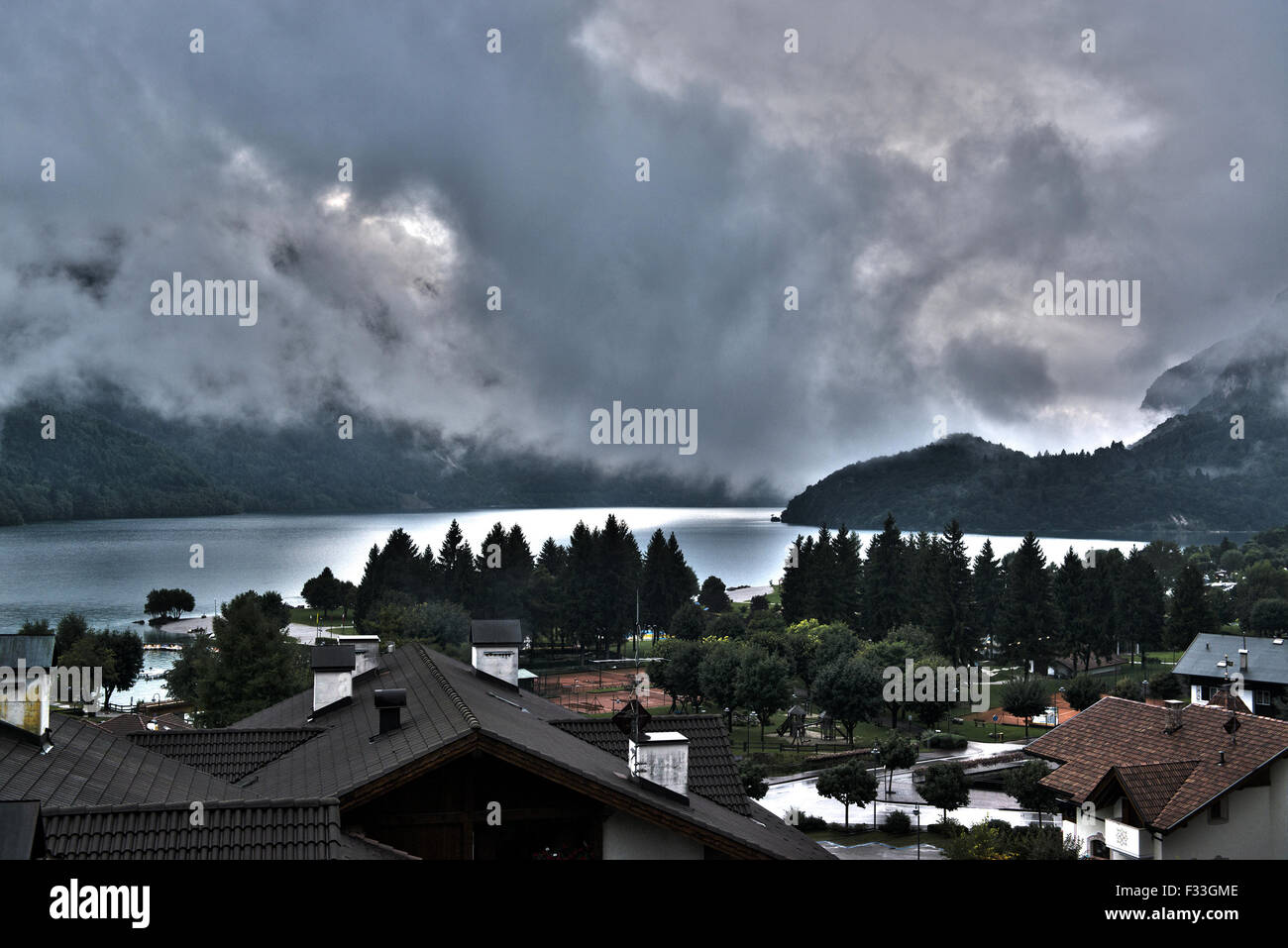Cloudy morning on the lake of Molveno in the summer season, Trentino - Dolomites, Italy Stock Photo