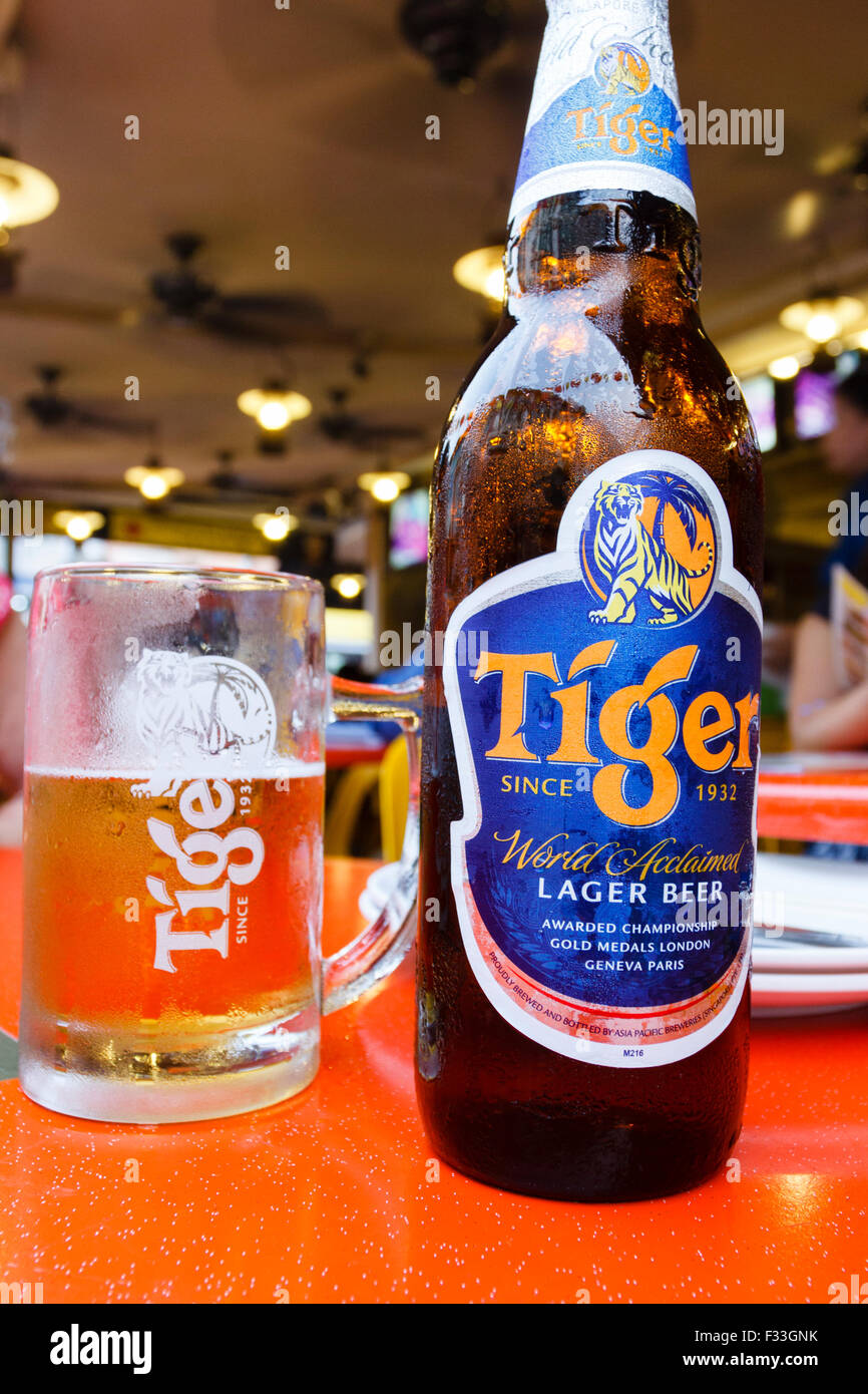 Bottle and glass of Tiger beer, China town, Singapore Stock Photo