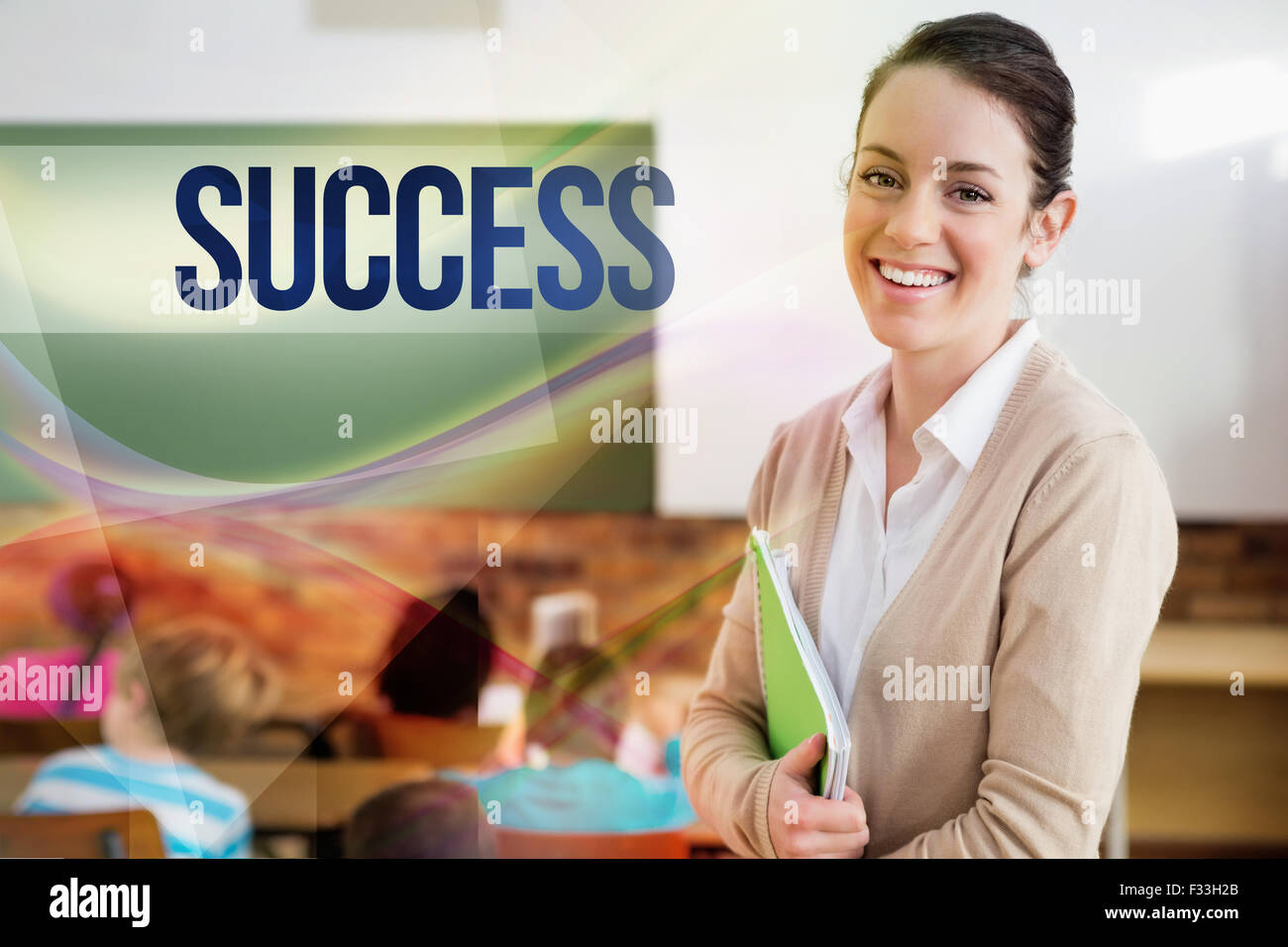 Success against pretty teacher smiling at camera at back of classroom ...