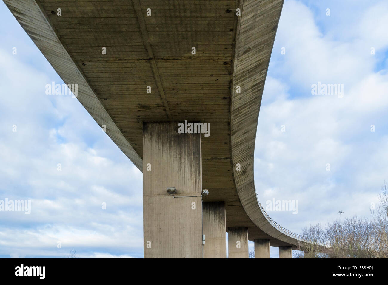 Concrete flyover or overpass. Below an overhead section of a road bridge, Nottingham, England, UK Stock Photo