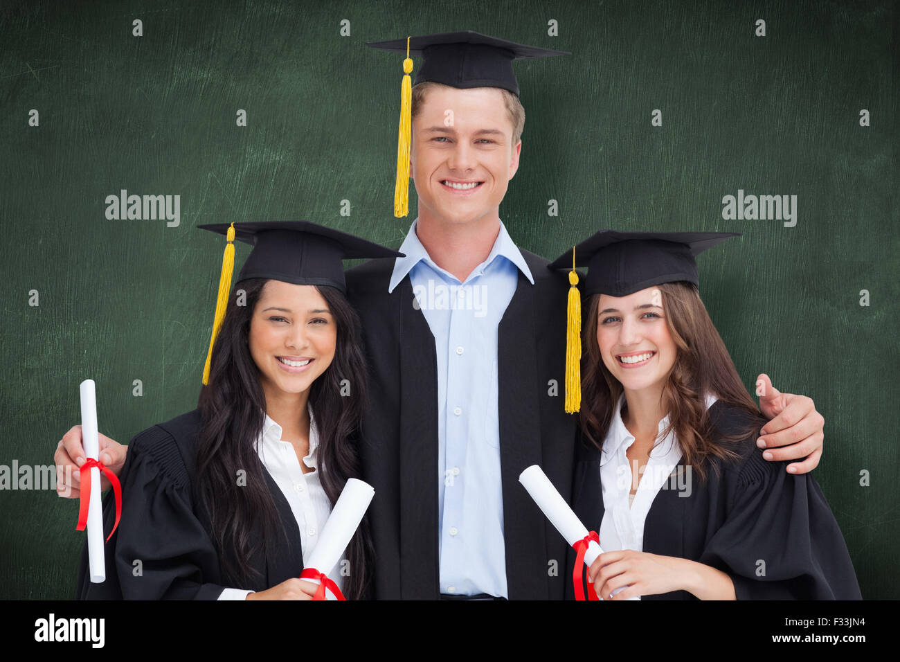 Composite image of three friends graduate from college together Stock ...