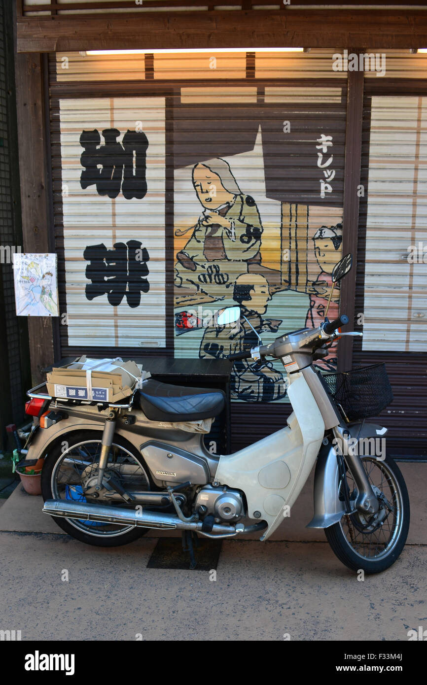 Scooter parked near parlor. Asakusa, Tokyo. Stock Photo