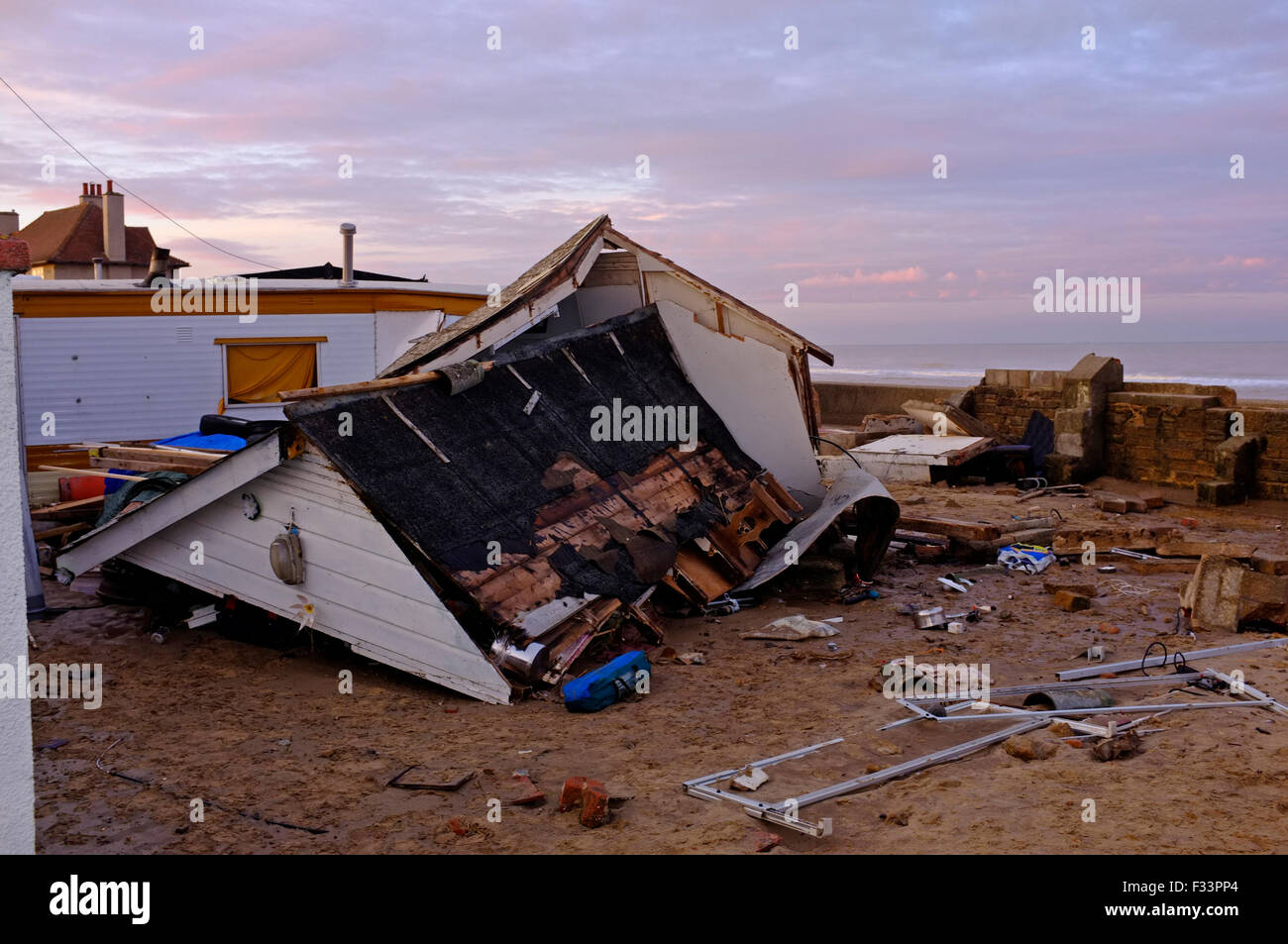 Storm damage after North Sea storm surge on night of 5 December 2013 Walcott Norfolk UK Stock Photo