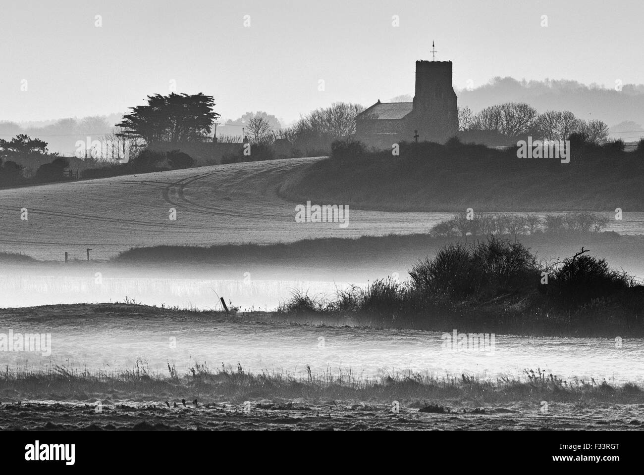 Salthouse Marshes at sunrise in early spring North Norfolk Stock Photo
