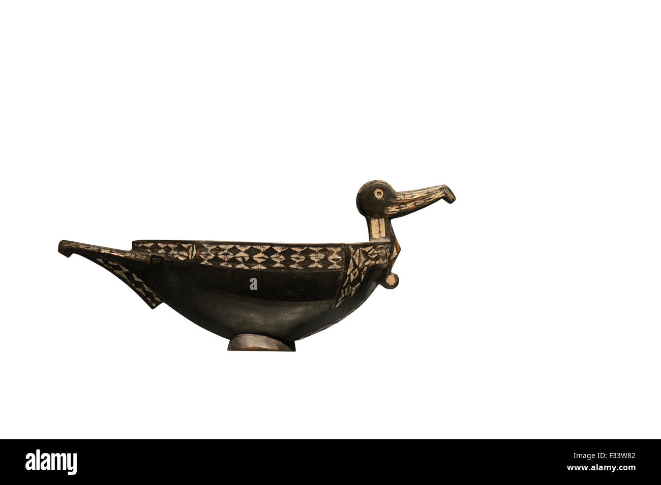 Frigate Birds are common motifs used around the Pacific. Early 20th century food bowl with pearl shell decoration from the Solom Stock Photo