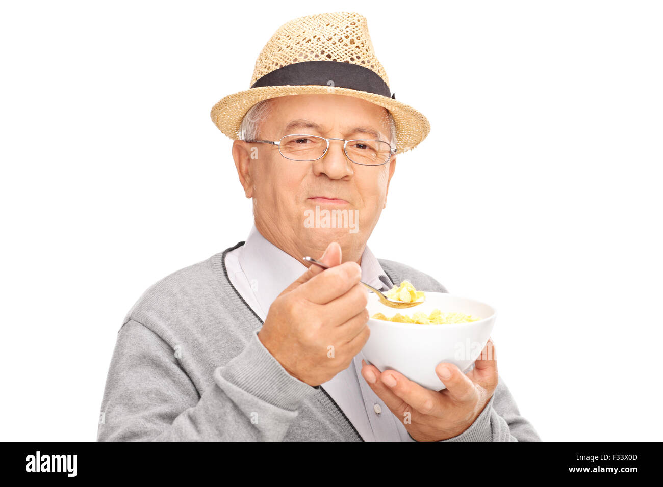 Old man eating cereal hires stock photography and images Alamy
