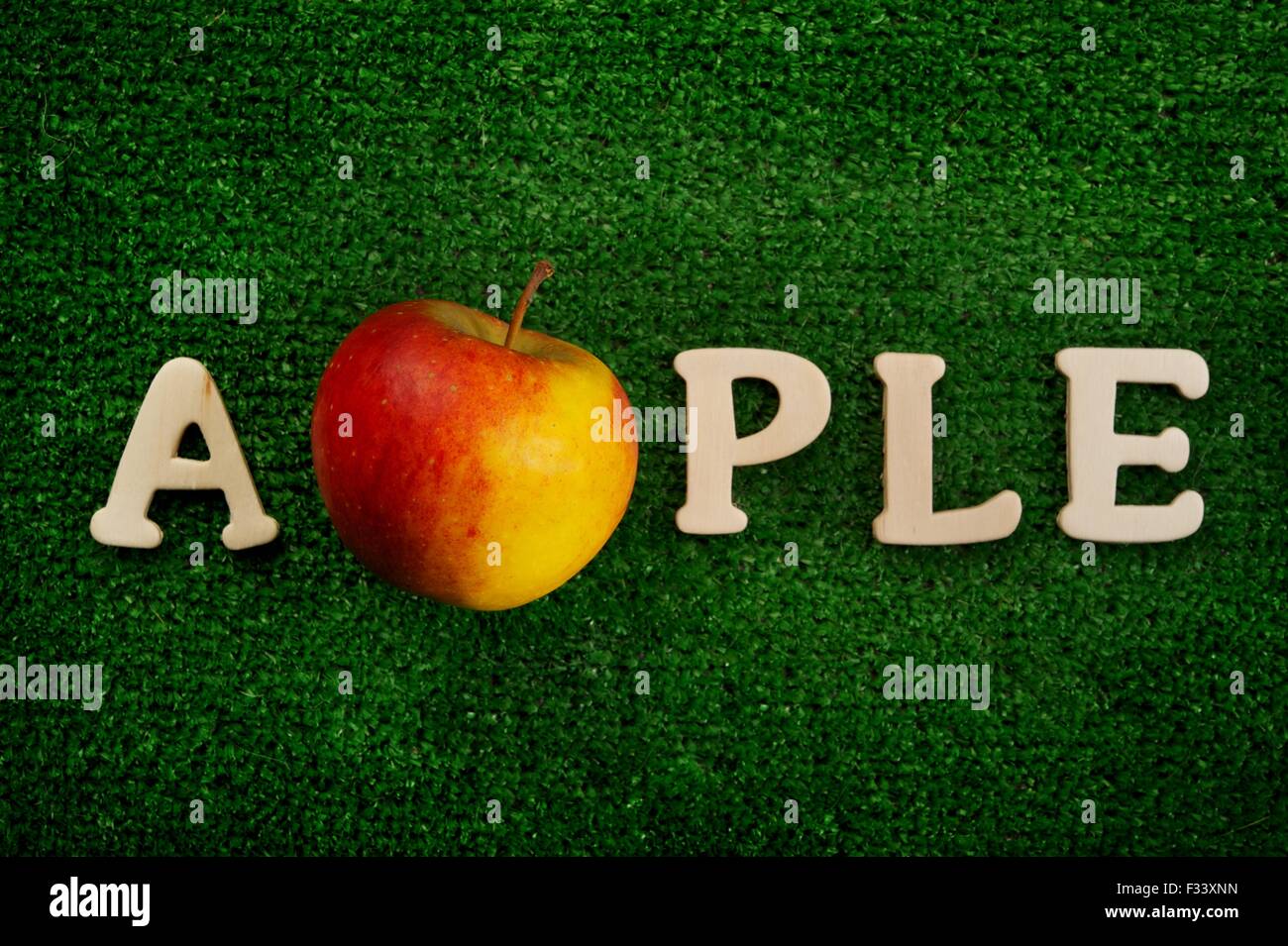 The word apple written on green background Stock Photo  Alamy