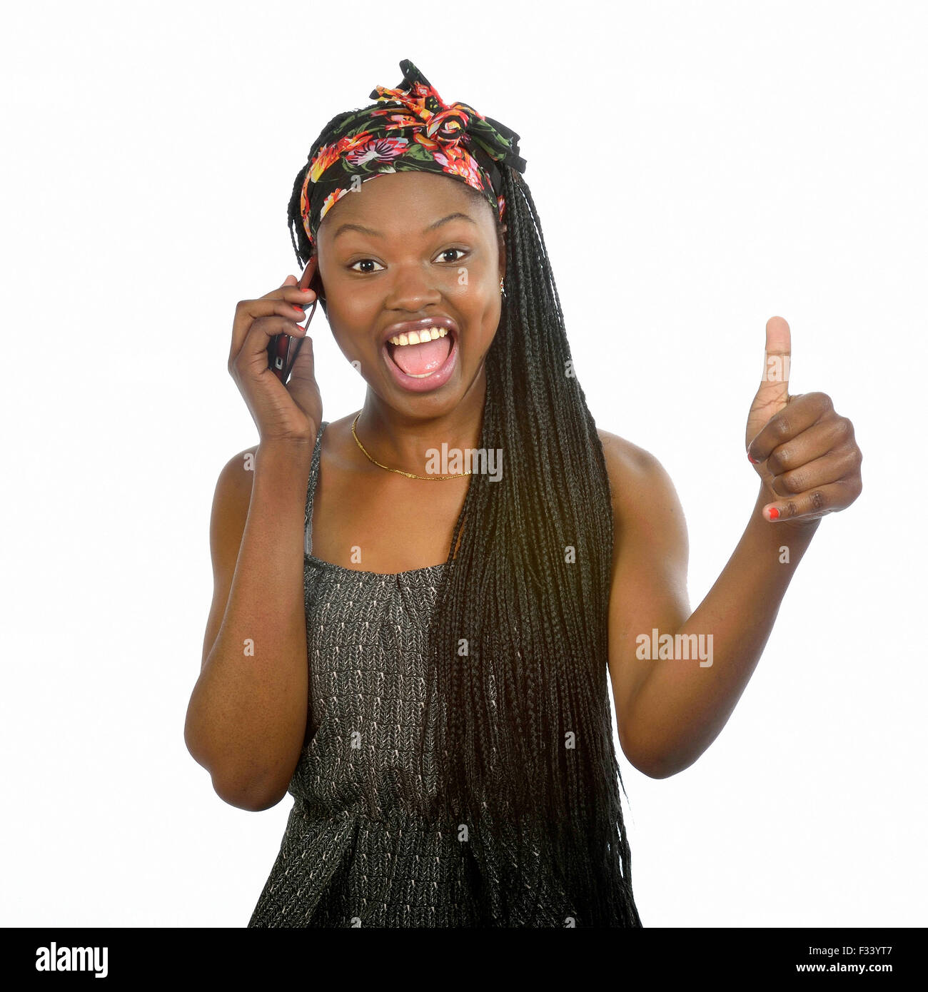 Young black girl with mobile phone Stock Photo
