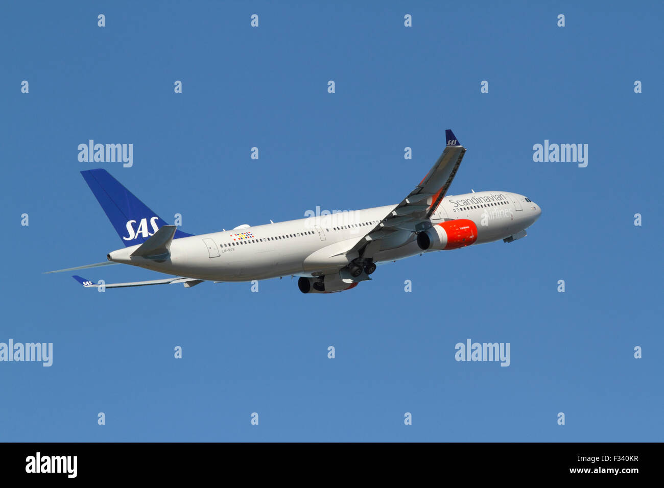 Copenhagen, Denmark. 29th September, 2015. LN-RKR flight SK925 takes off from CPH Kastrup Airport. Scandinavian Airlines SAS has taken delivery of the first of four new long-haul Airbus A330-300 Enhanced, a medium  to long-range, wide-body, twin-engine jet. The aircraft has been in commercial operation since the 21st September. First on a few flights to and from Chicago – and the last few days to and from Washington (IAD). Credit:  Niels Quist/Alamy Live News Stock Photo