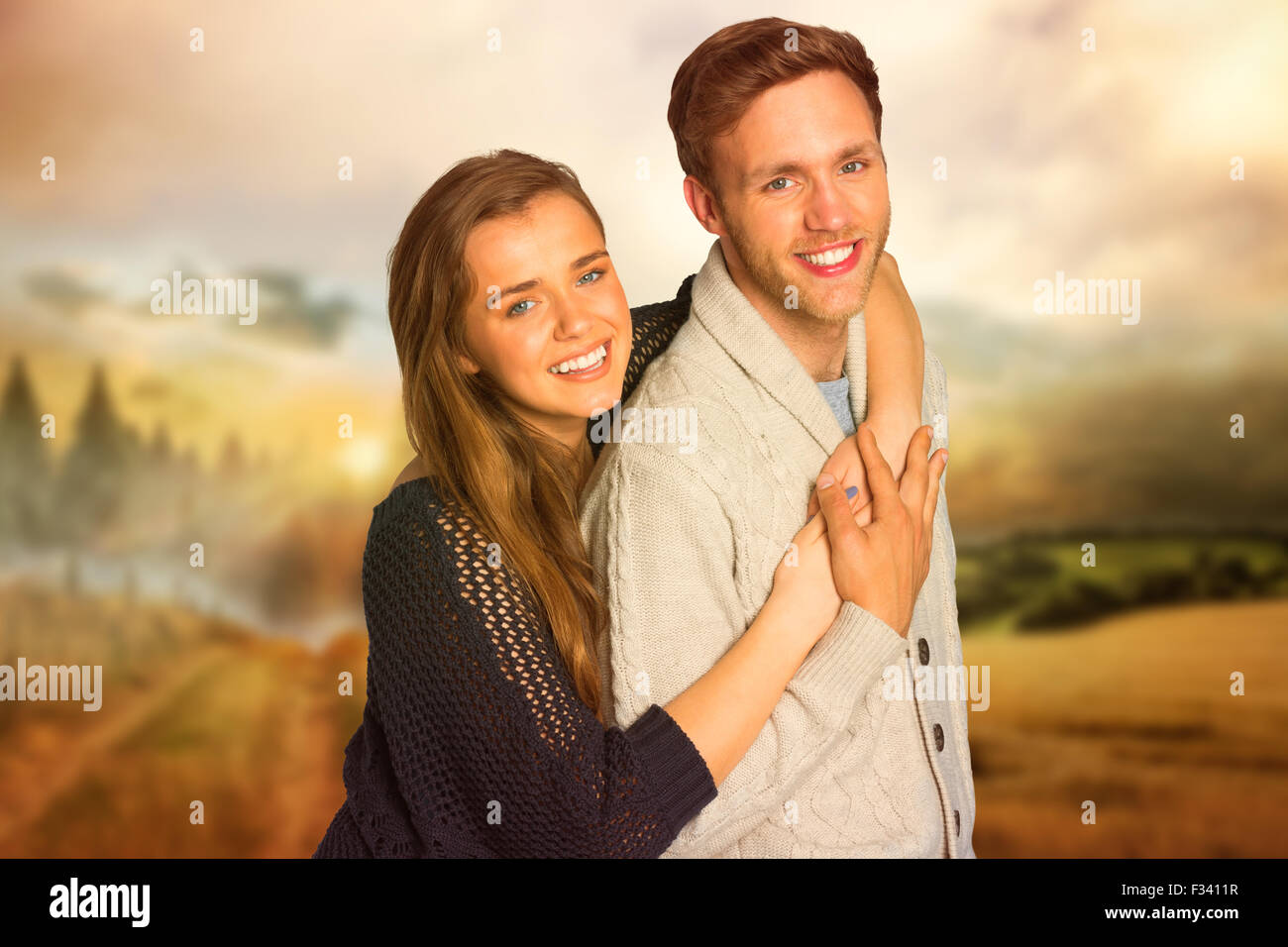 Composite image of portrait of happy young couple Stock Photo - Alamy