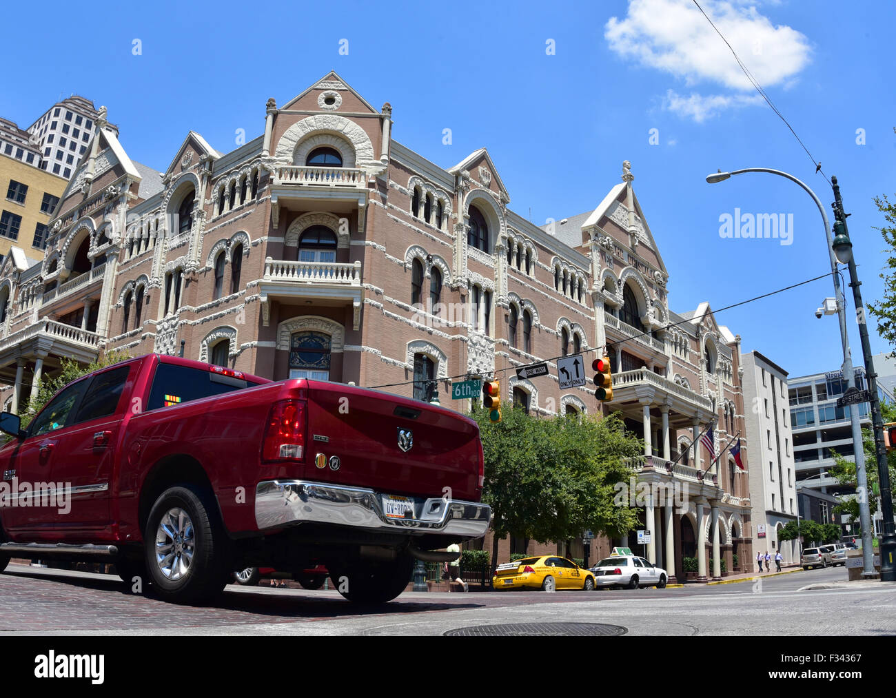 Austin.Texas.United States of America.August 2015Sixth street from the historic tenement house and the side pint vehicle in the Stock Photo