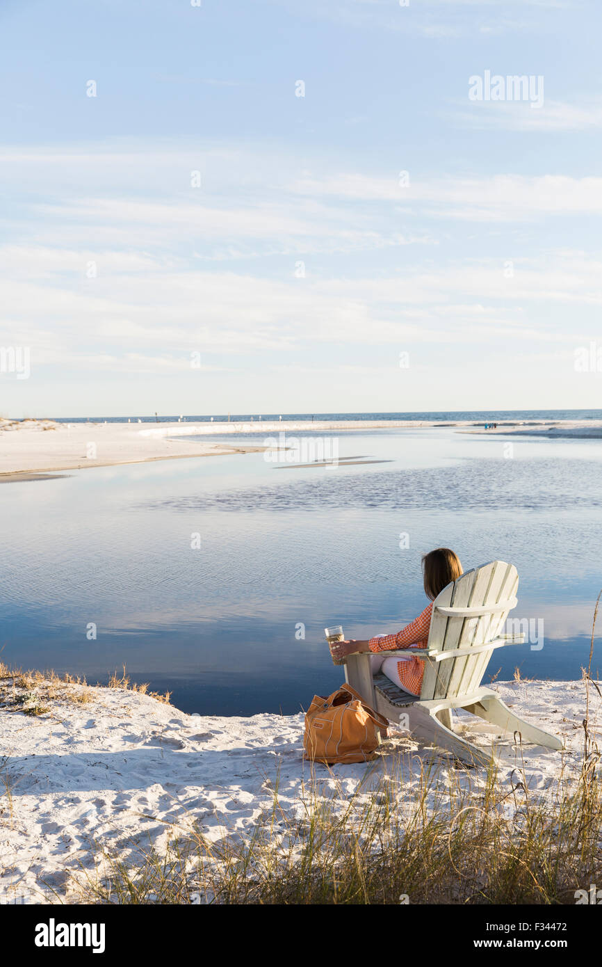 Sitting on the beach hi-res stock photography and images - Alamy
