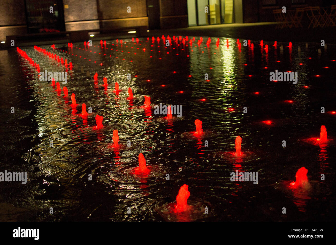Colourful fountains behind Kings Cross station on Granary Square Stock Photo Alamy