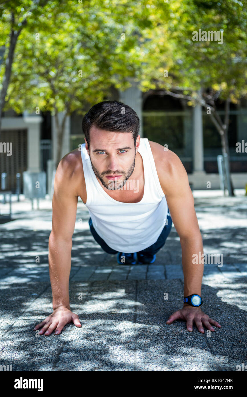 Handsome athlete doing push ups Stock Photo - Alamy