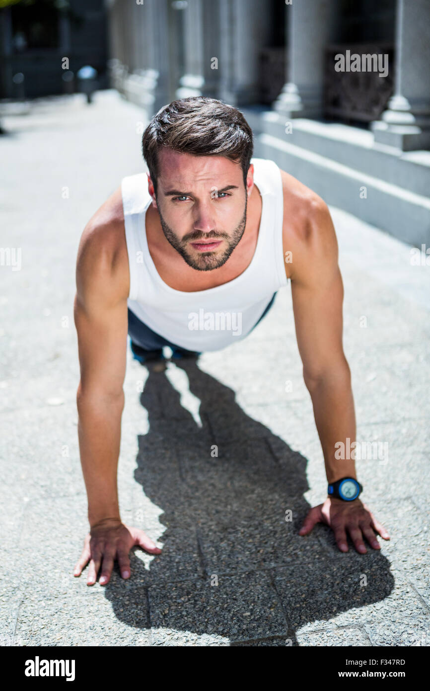 Handsome athlete doing push ups Stock Photo Alamy