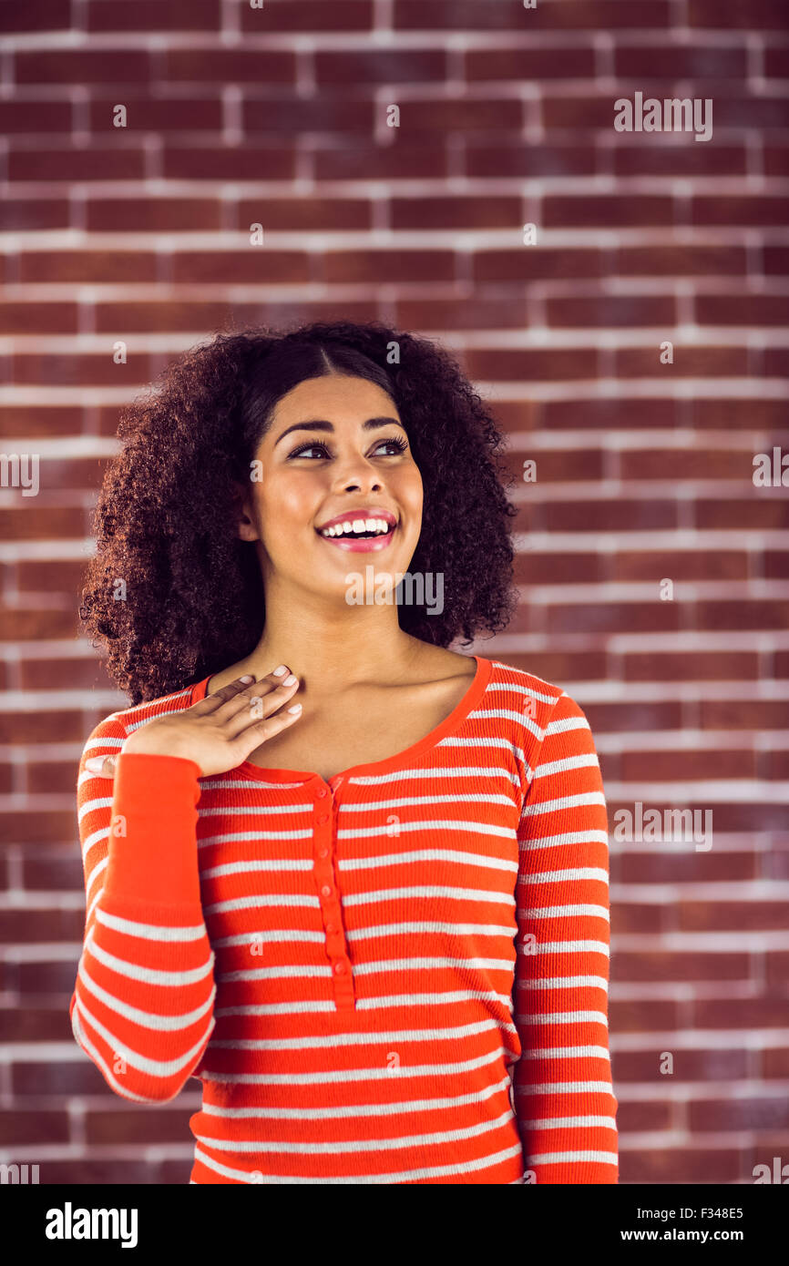 Surprised attractive young woman Stock Photo - Alamy