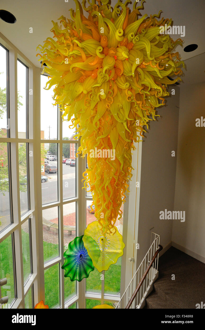 Dale Chihuly 'Yellow Neon Chandelier' glass sculpture in the Columbus Area Visitors Center, Columbus, Indiana Stock Photo