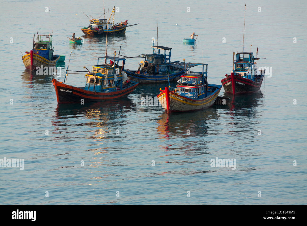 boats anchored off Mũi Né fishing village, Bình Thuận Province, Vietnam Stock Photo