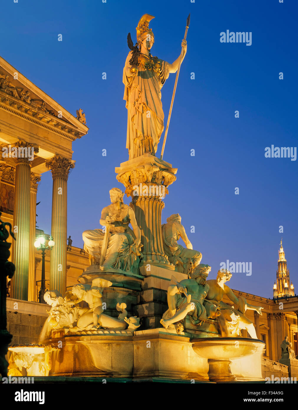 Vienna, Austria.  The Athena Fountain (Pallas-Athene-Brunnen) in front of Austrian Parliament building.  The fountain was create Stock Photo