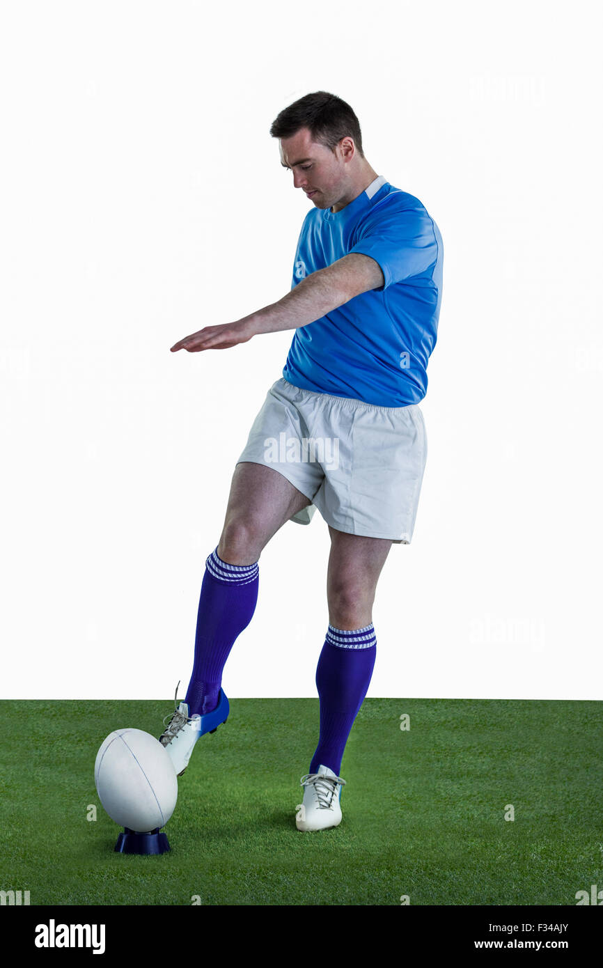 Rugby player doing a drop kick Stock Photo Alamy