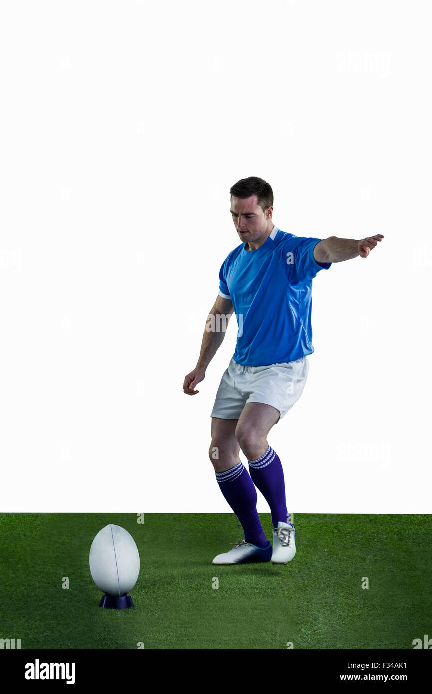 Rugby player doing a drop kick Stock Photo Alamy