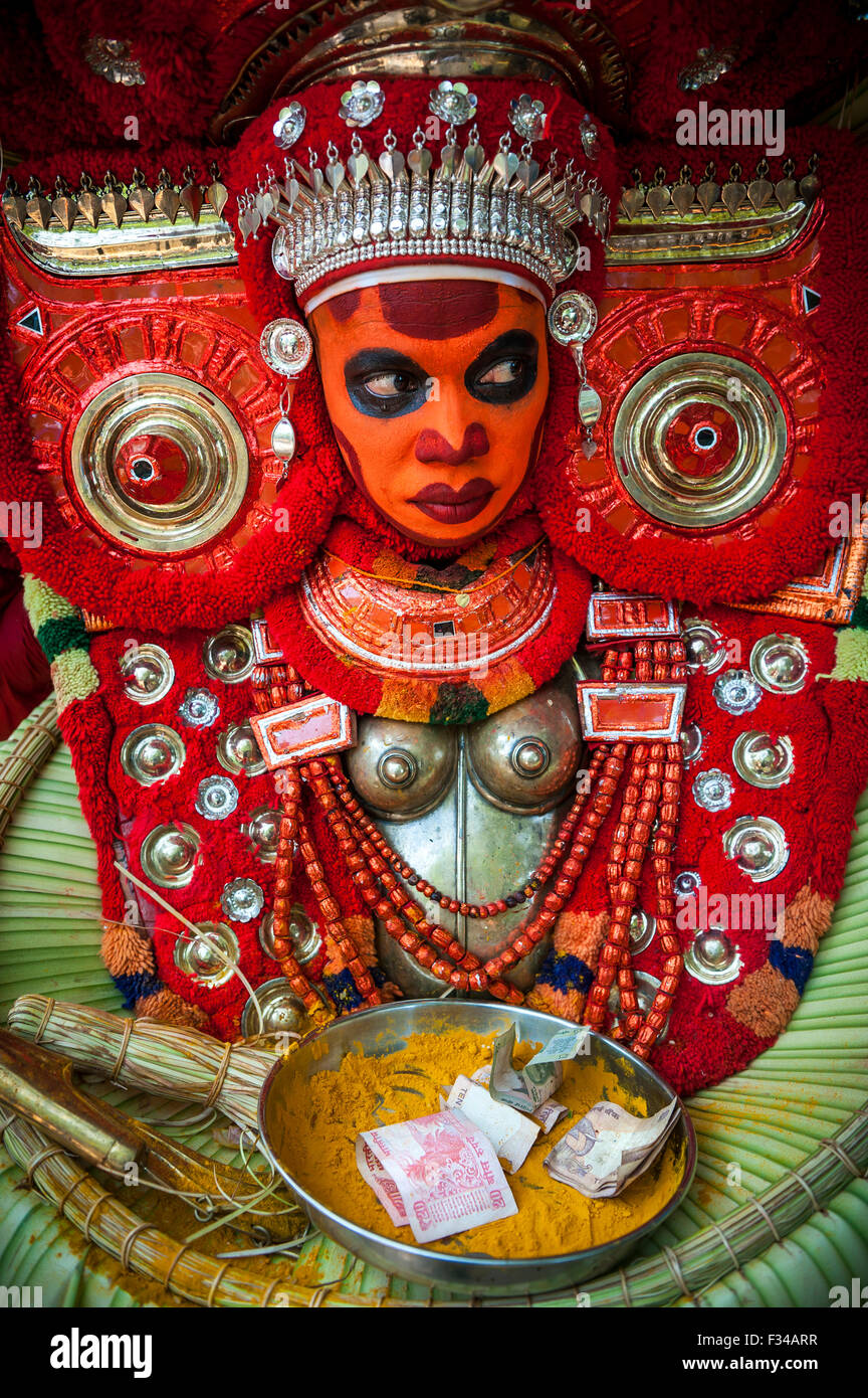 Theyyam ritual performed in the area of Kannur, Kerala, India. Stock Photo