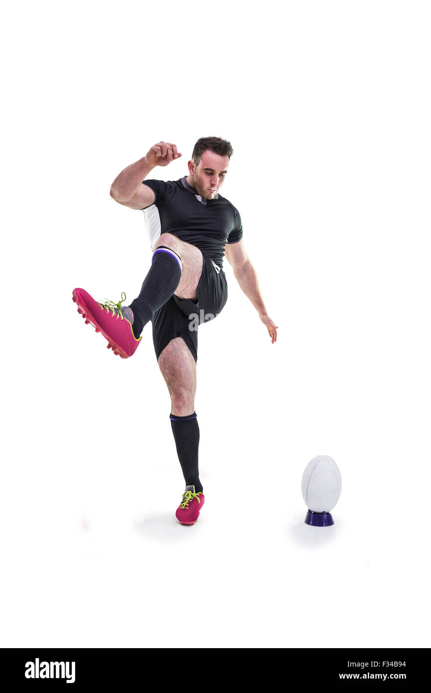Rugby player kicking the ball Stock Photo Alamy