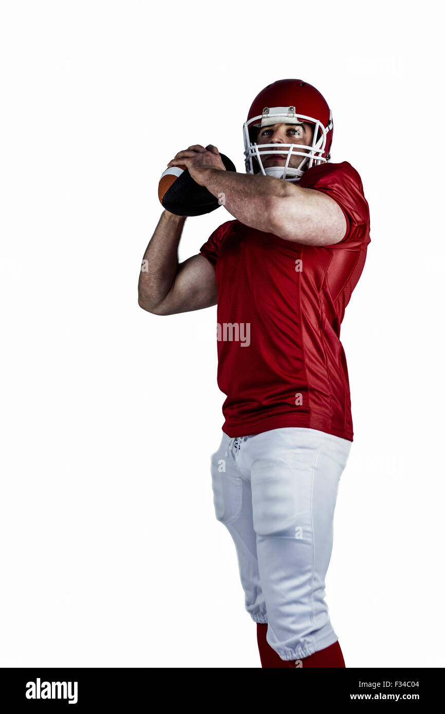 American football player throwing ball Stock Photo Alamy