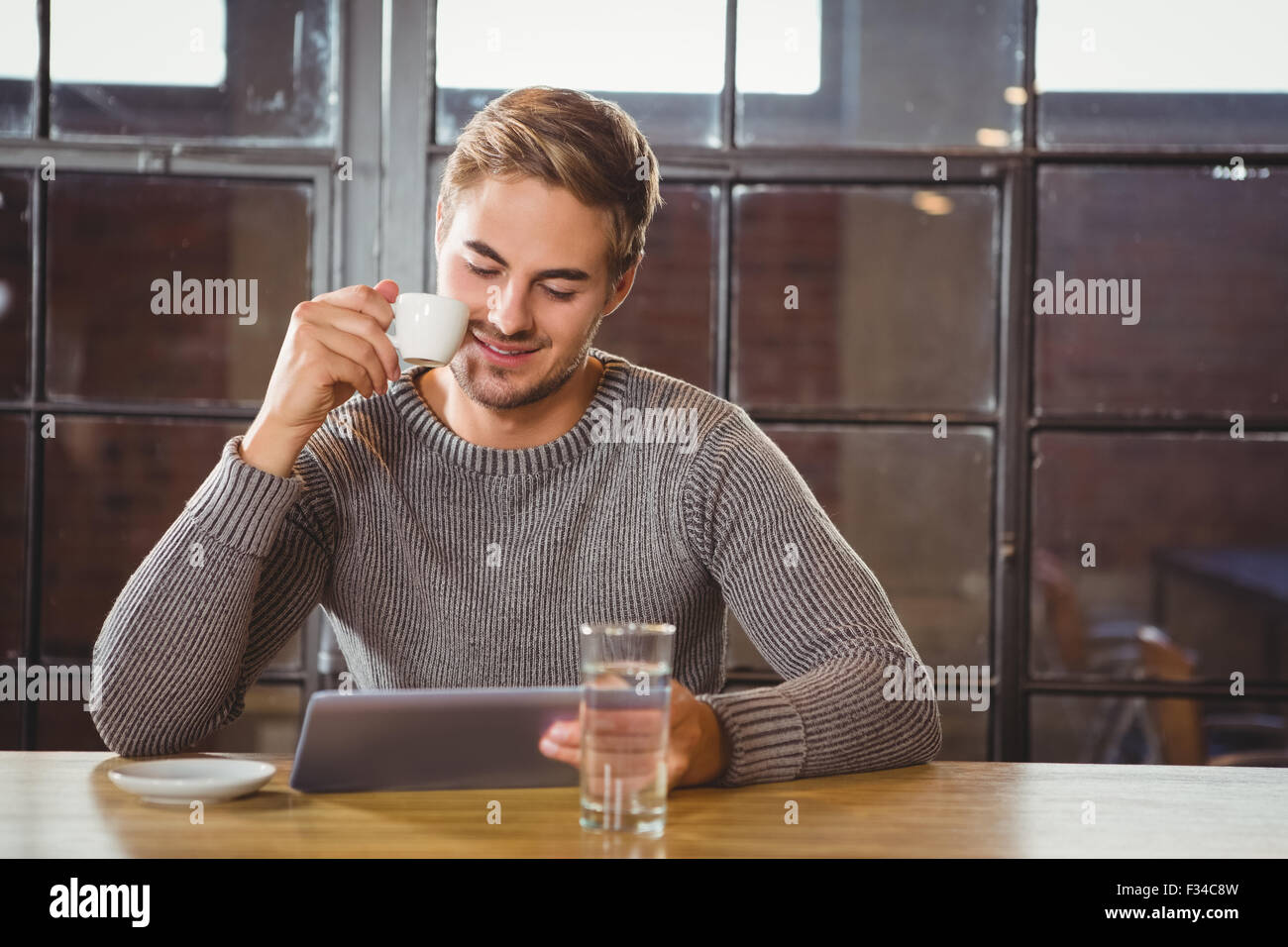 Attractive Man Drinking Coffee in a Bar Coffee Mug by Stefano C
