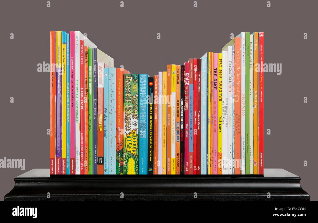 Bookshelf with a color assortment of Lerner Publishing Group books Stock Photo