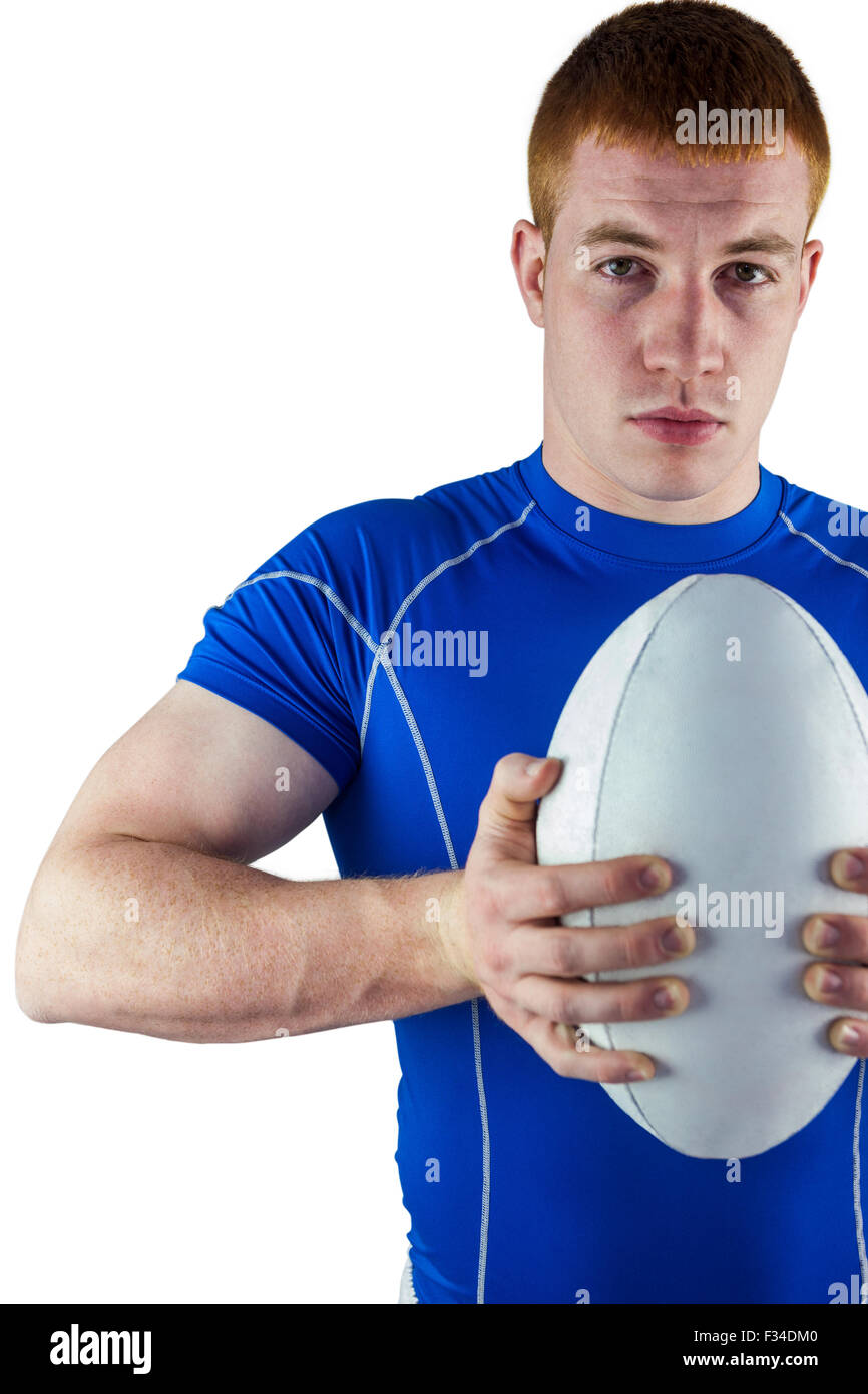 Rugby player holding rugby ball Stock Photo Alamy