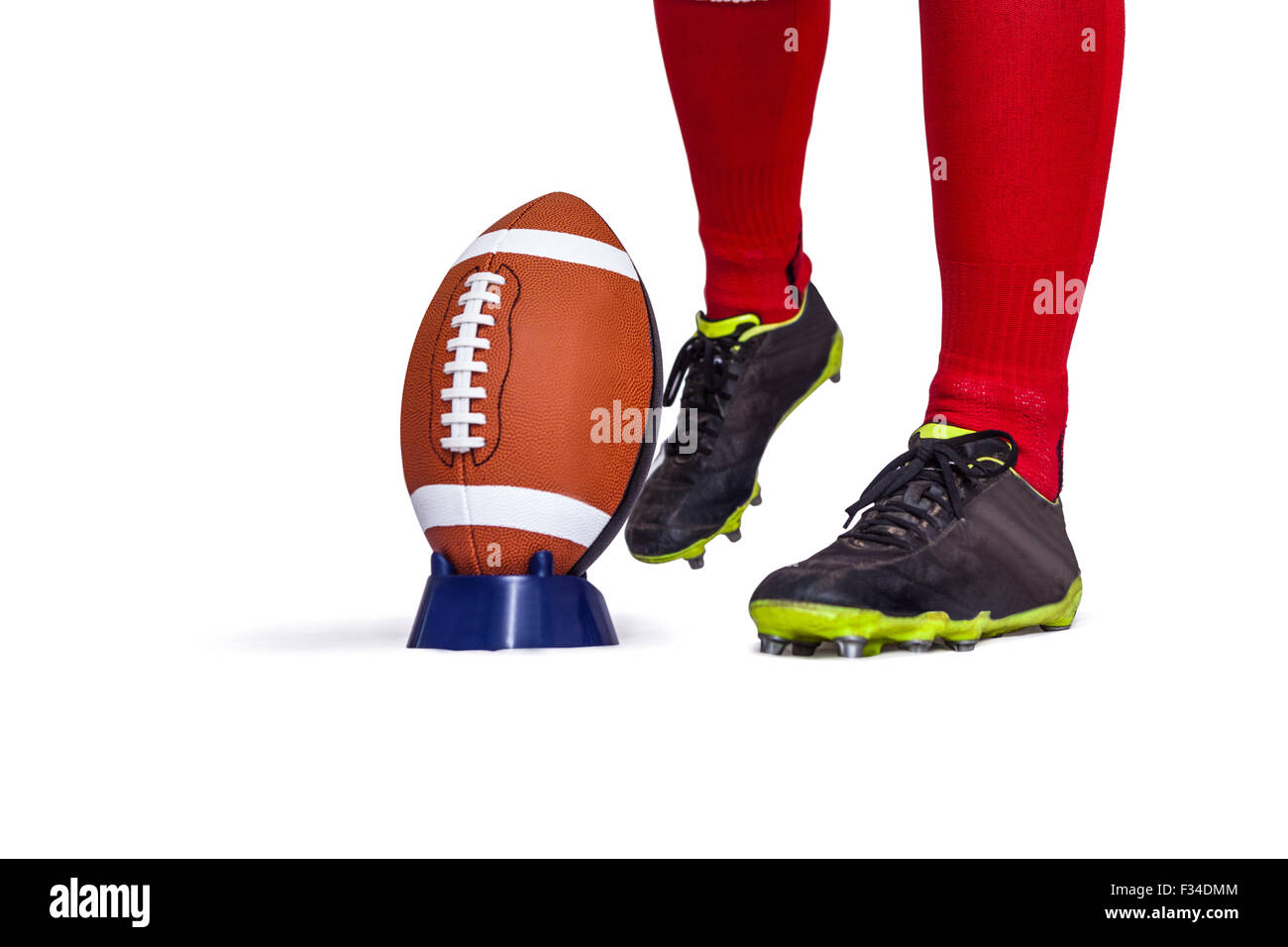 American football player about to kick the ball Stock Photo Alamy