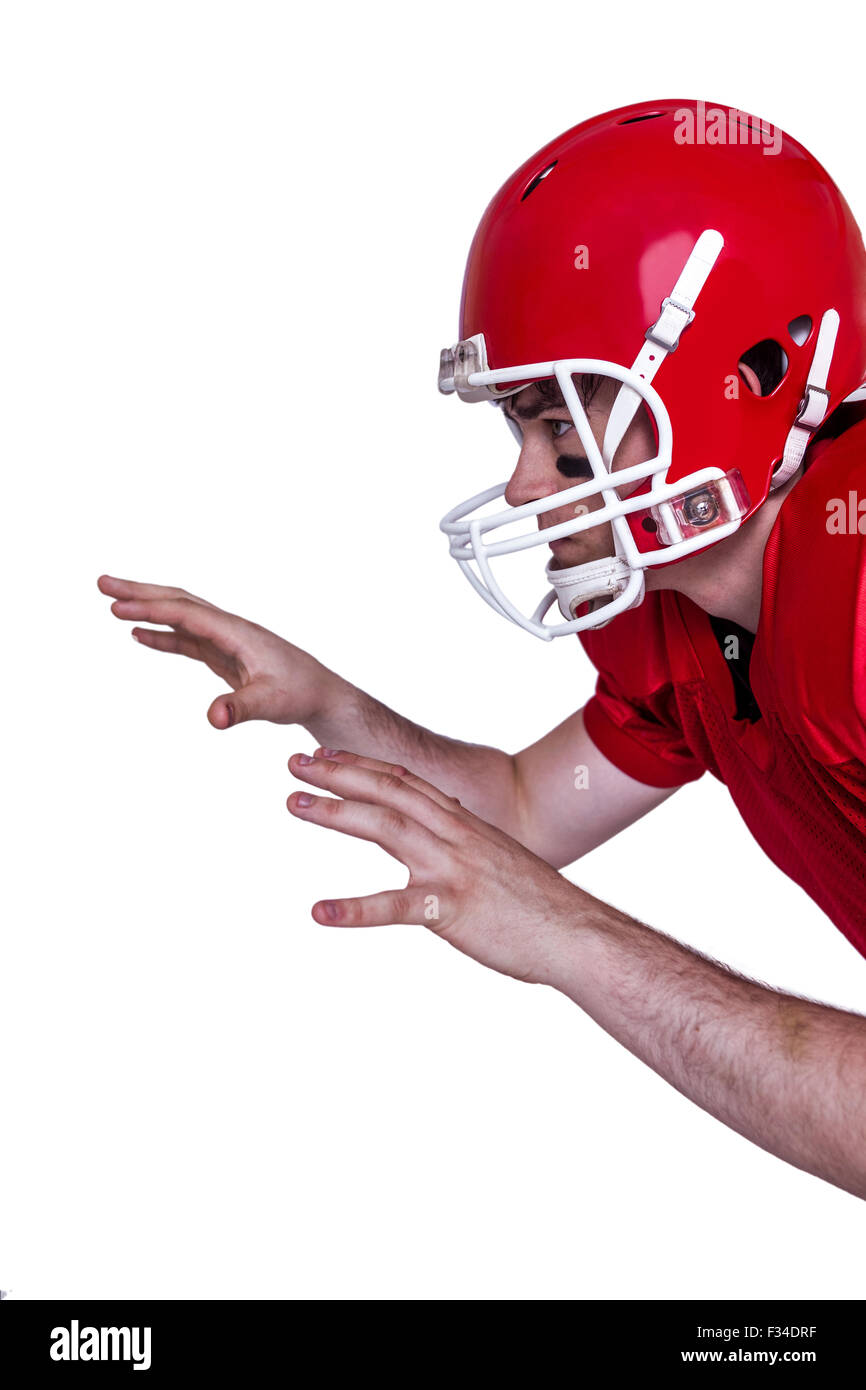 American football player about to catch a ball Stock Photo