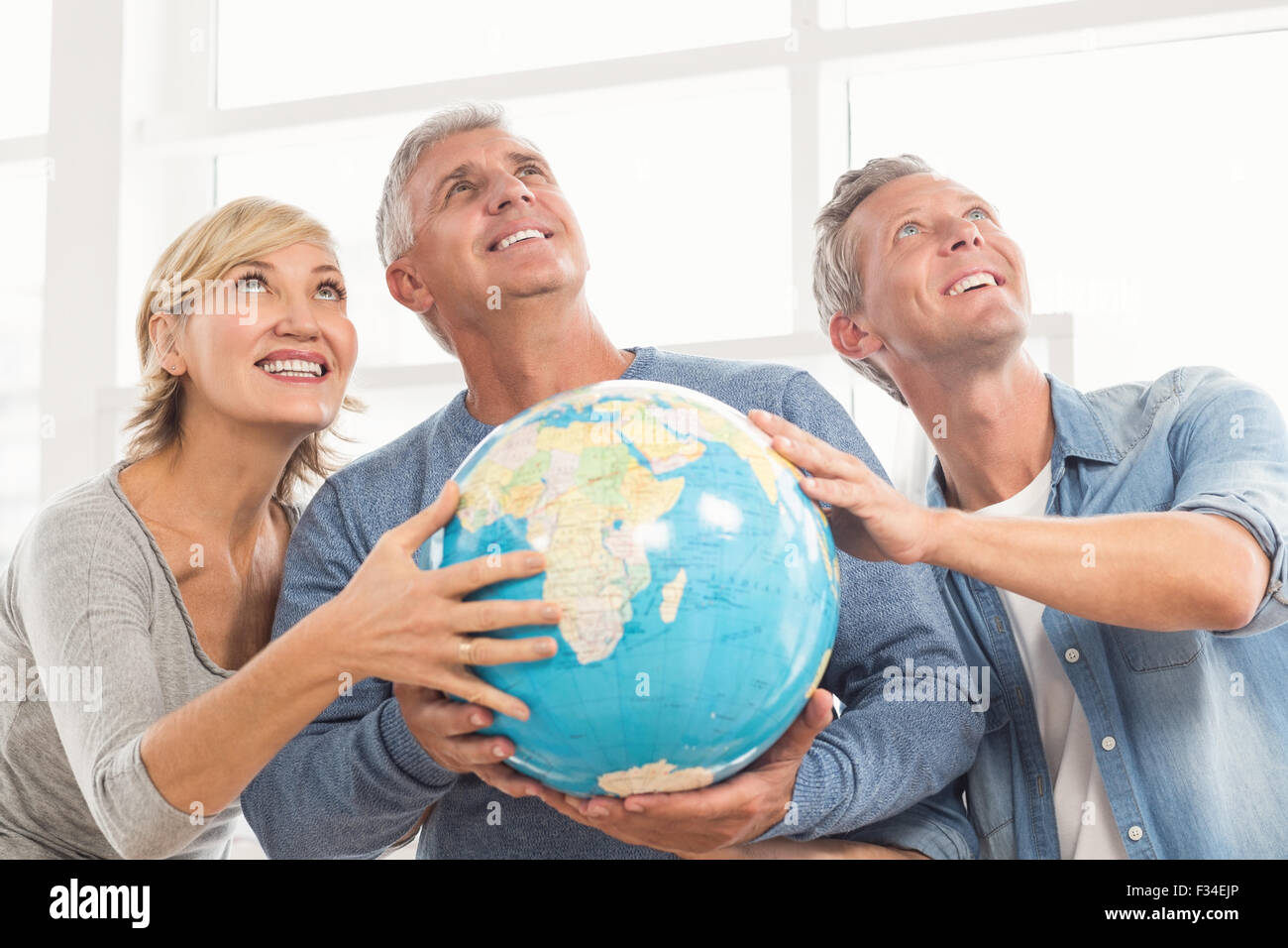 Woman holding globe on hands hi-res stock photography and images - Alamy