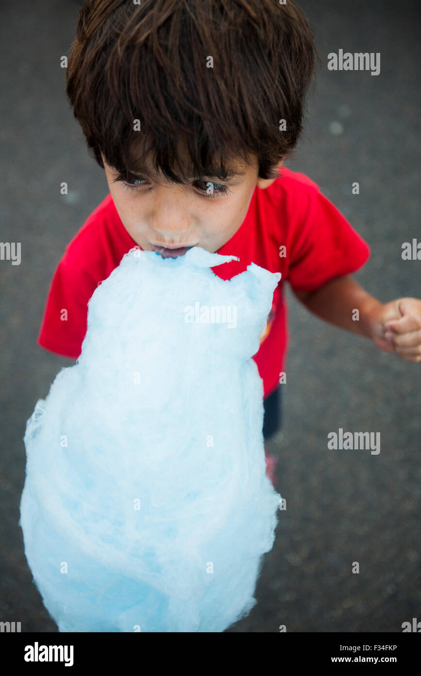 Boy eating cotton candy in Legoland, Billund. Denmark ...