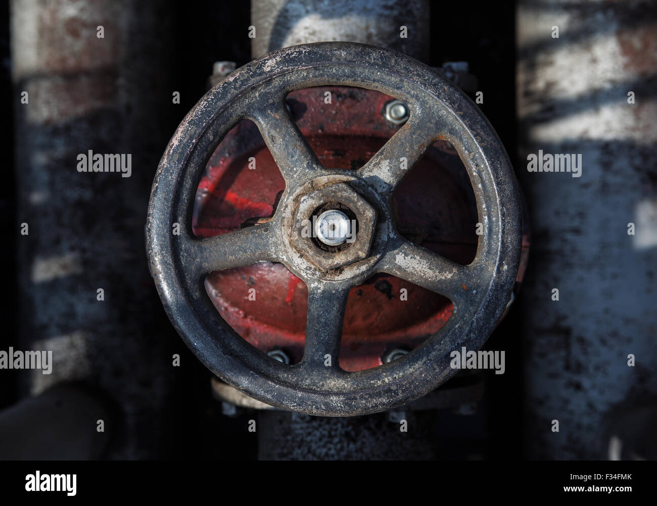old handwheel of valve. top view Stock Photo