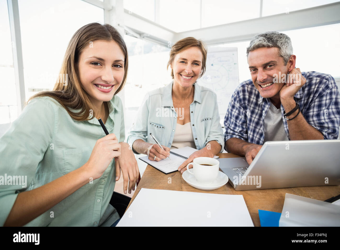 Casual business people speaking together Stock Photo