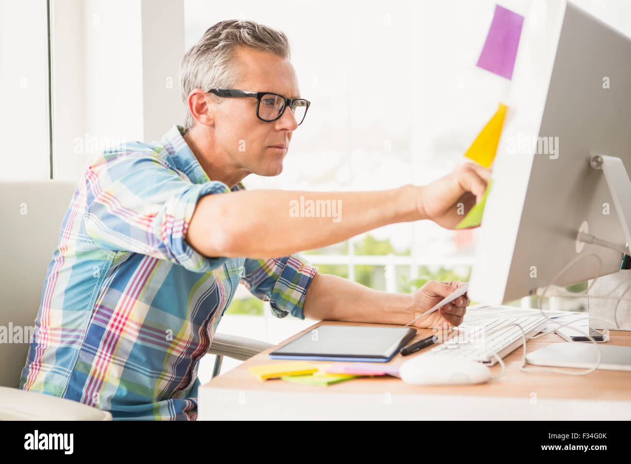 Computer reading typing designer hi-res stock photography and images ...