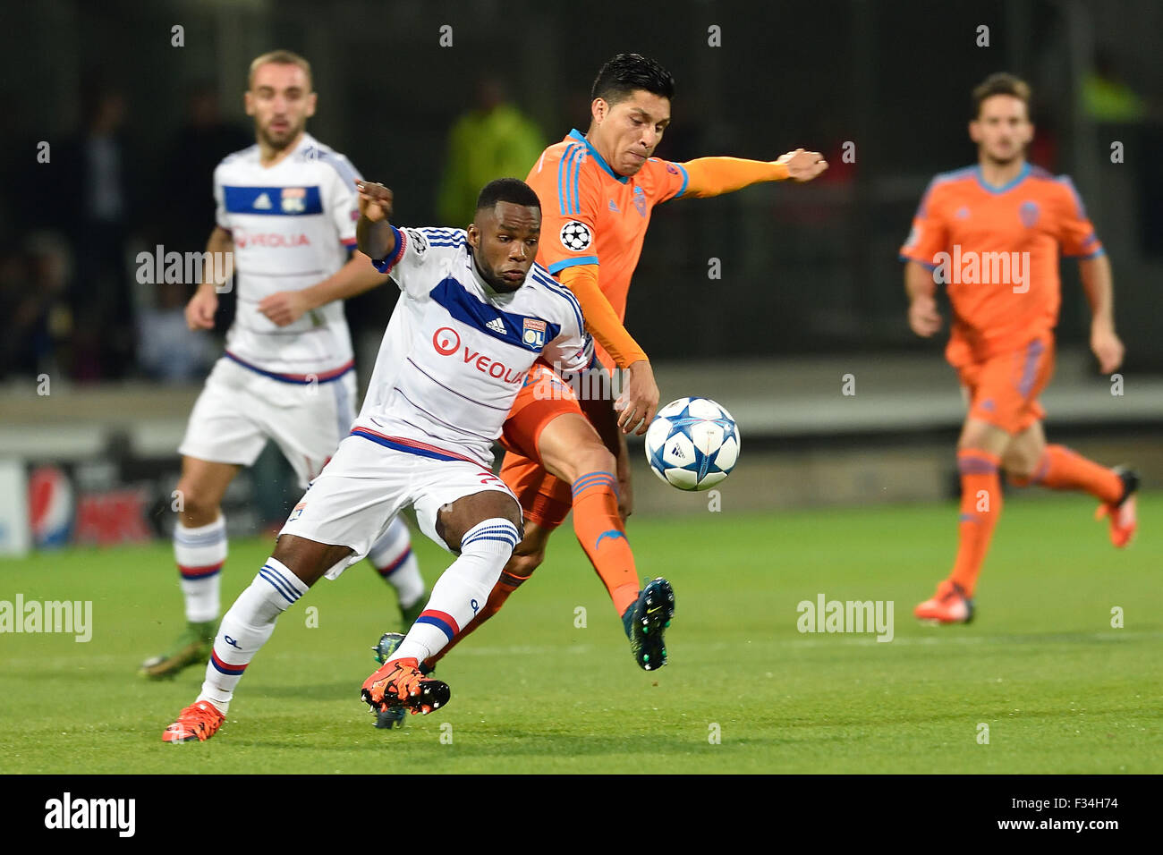 Lyon, France. 29th Sep, 2015. UEA Champions League group stages. Lyon versus Valencia. Aldo Kalulu (lyon) and Enzo Perez (valence) Credit:  Action Plus Sports/Alamy Live News Stock Photo