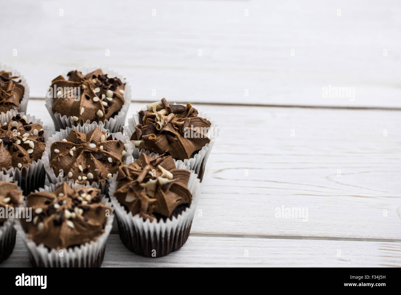 Chocolate cupcakes on a table Stock Photo