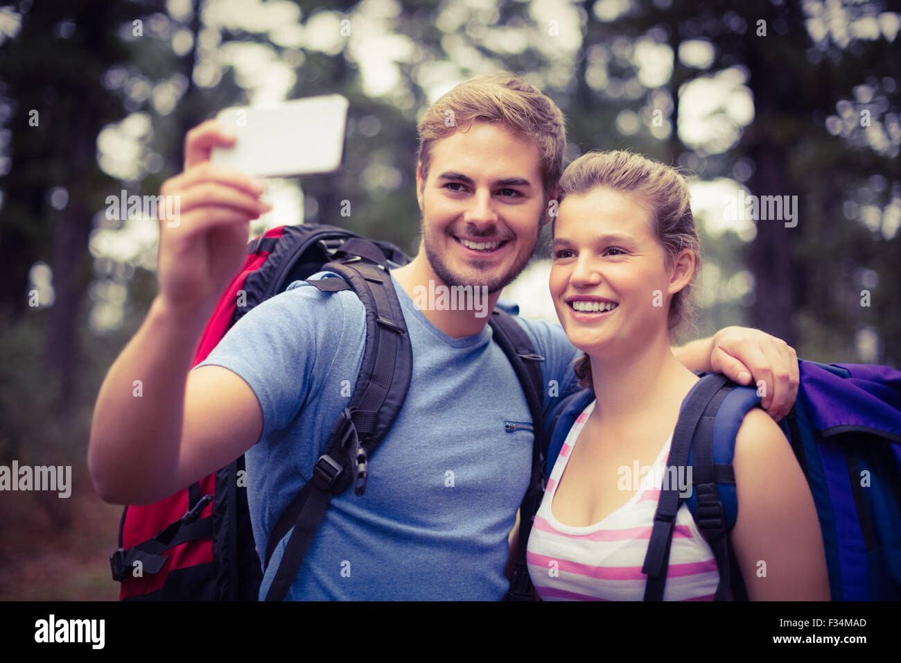Young happy hikers taking a selfie Stock Photo - Alamy