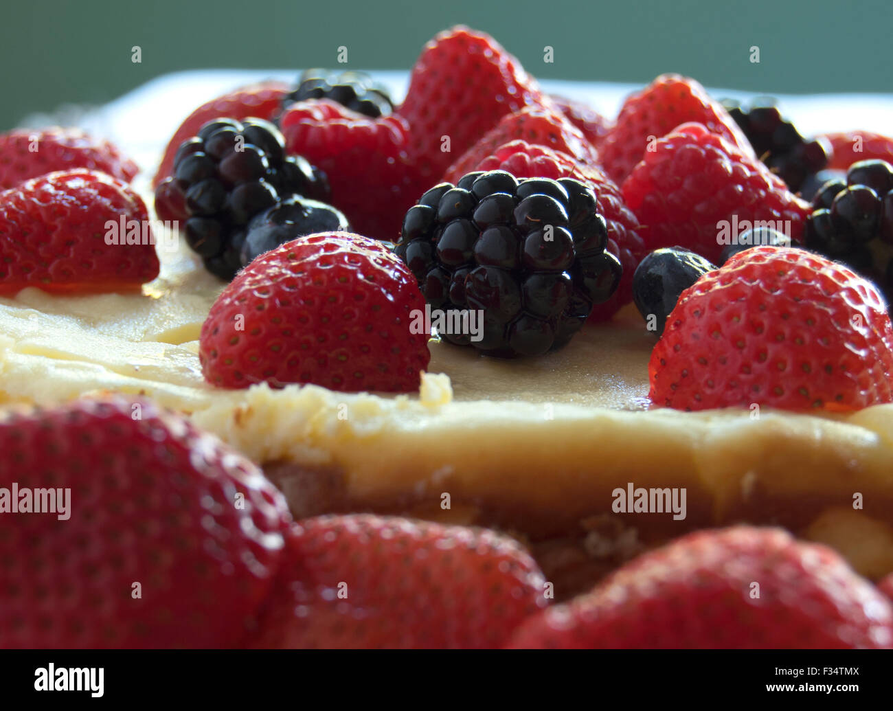 cheesecake with strawberries, blackberries and raspberries Stock Photo
