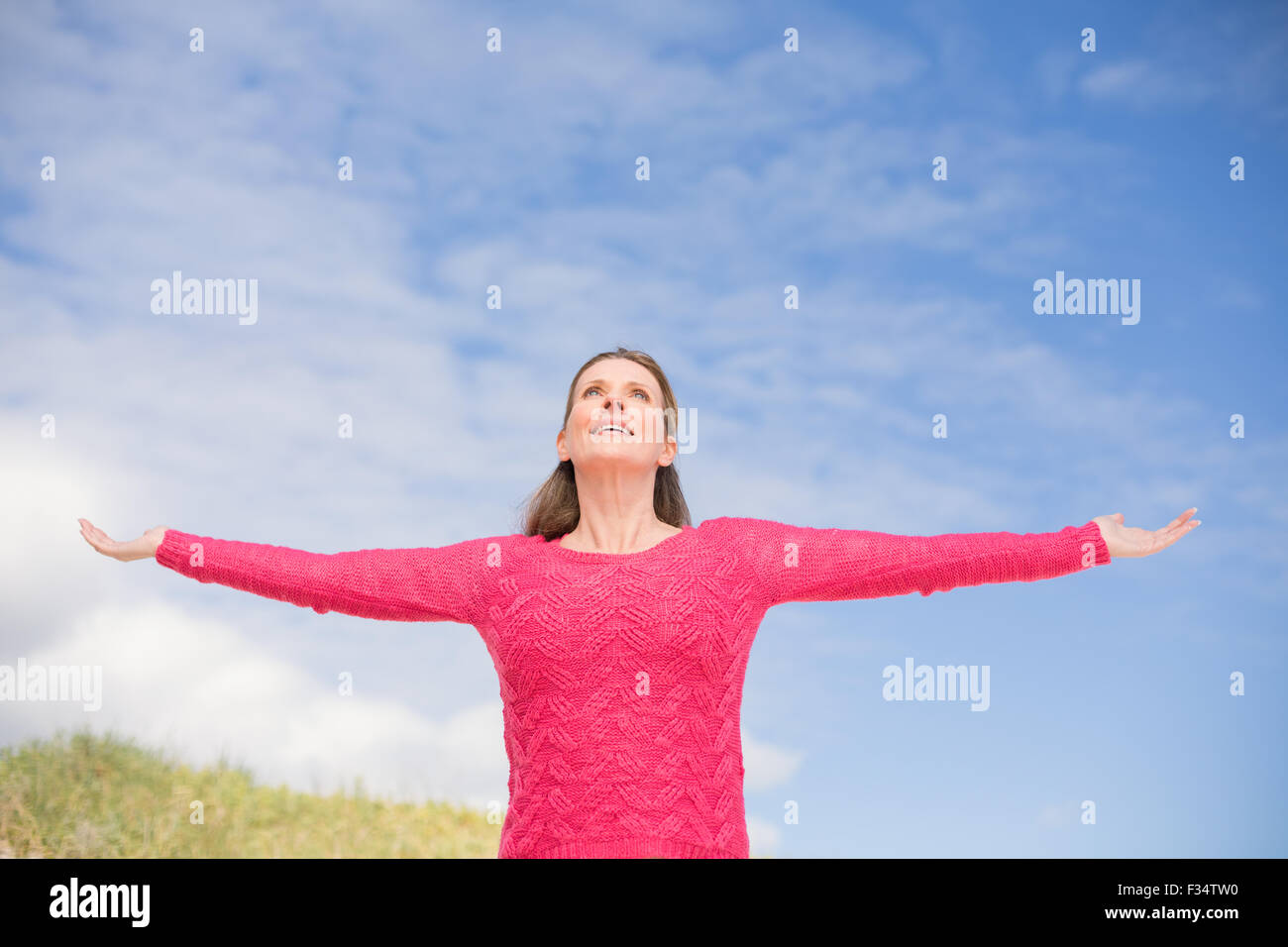 Woman in pink top wearing hi-res stock photography and images - Alamy