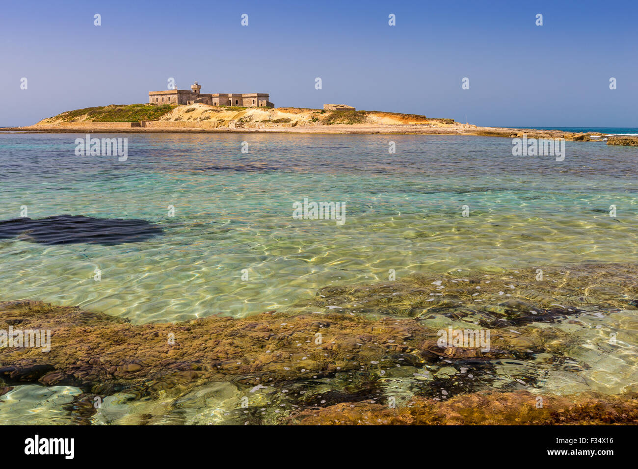 The island of currents. Correnti Island. Isola delle Correnti, Portopalo di Capo Passero, Sicily. Stock Photo