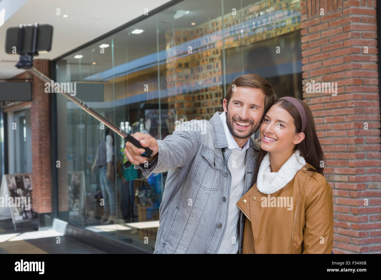 Young happy couple taking a selfie Stock Photo - Alamy