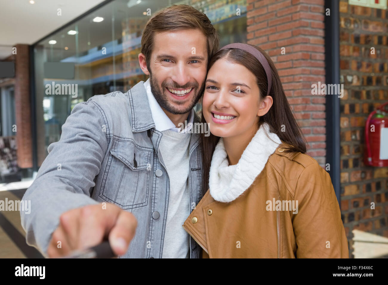 Young happy couple taking a selfie Stock Photo - Alamy