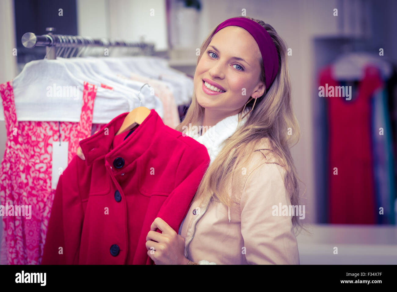 Holding coat hi-res stock photography and images - Alamy
