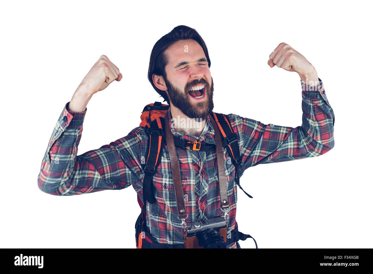 Excited adventurer with arms raised Stock Photo