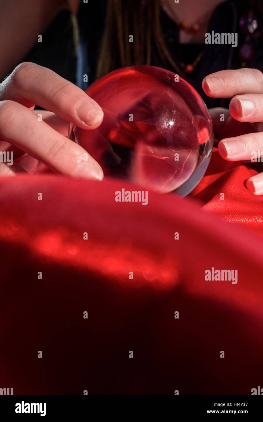 Fortune teller using crystal ball Stock Photo Alamy