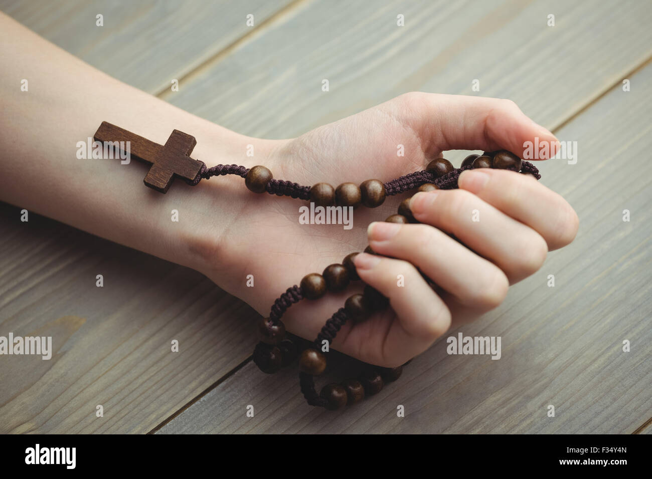 Woman hand rosary hi-res stock photography and images - Alamy
